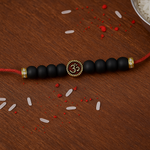 Load image into Gallery viewer, Karungali Rakhi: The Sacred Knot of Protection Love Rocks