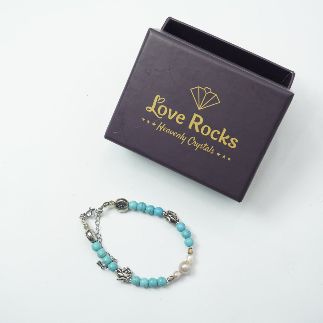 Turquoise Bracelet: Lotus and Plus Charms