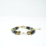 Load image into Gallery viewer, Snowflake Obsidian Bracelet: Conch and Lotus Charms
