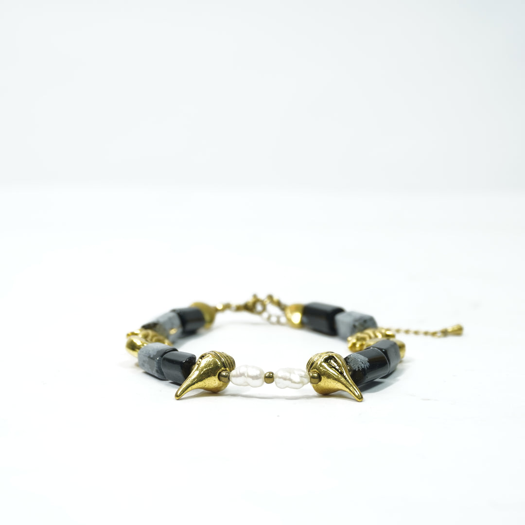 Snowflake Obsidian Bracelet: Conch and Lotus Charms