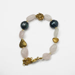 Load image into Gallery viewer, Rose Quartz Bracelet: Heart and Lotus Charms