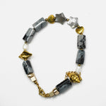 Load image into Gallery viewer, Snowflake Obsidian Bracelet: Lotus and Conch Charms