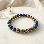 Load image into Gallery viewer, Champion Energy Bracelet – MI Jersey Edition (Lapis Lazuli & Golden Pyrite)