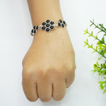 Load image into Gallery viewer, Black Onyx Silver Bracelet - Flower Pattern
