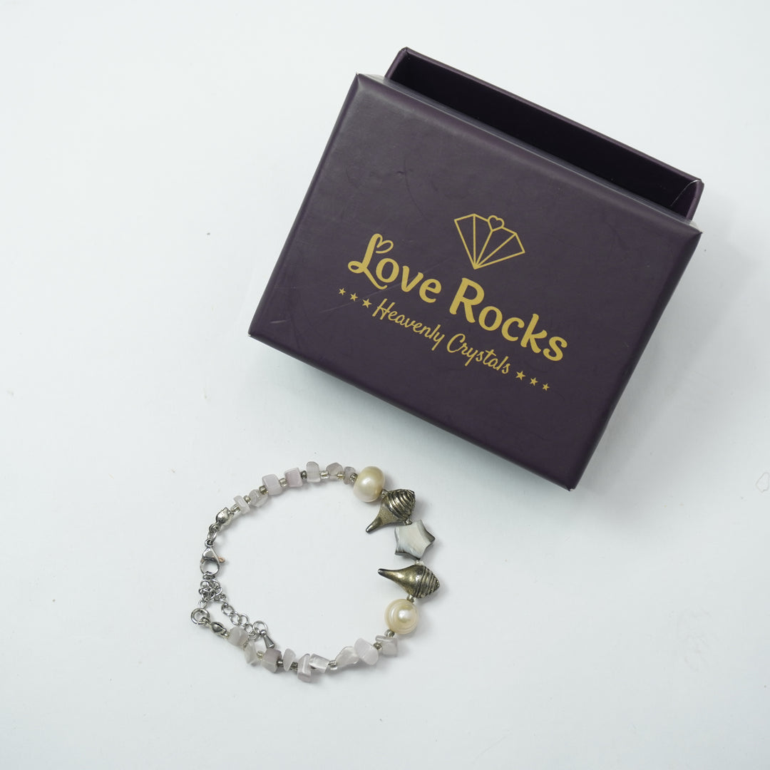 Pink Selenite Bracelet: Conch and Star Charms