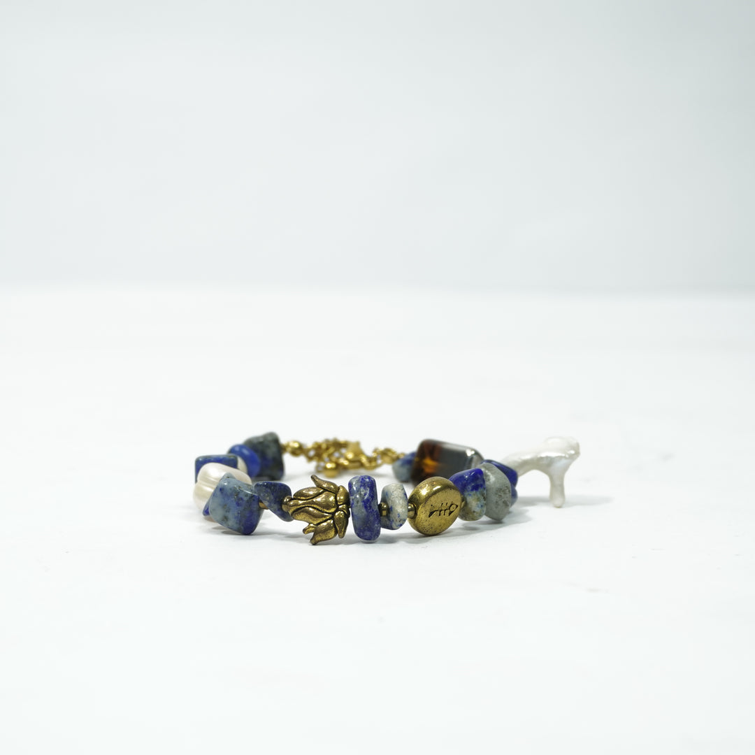 Grey Selenite Bracelet: Round Fish Charms