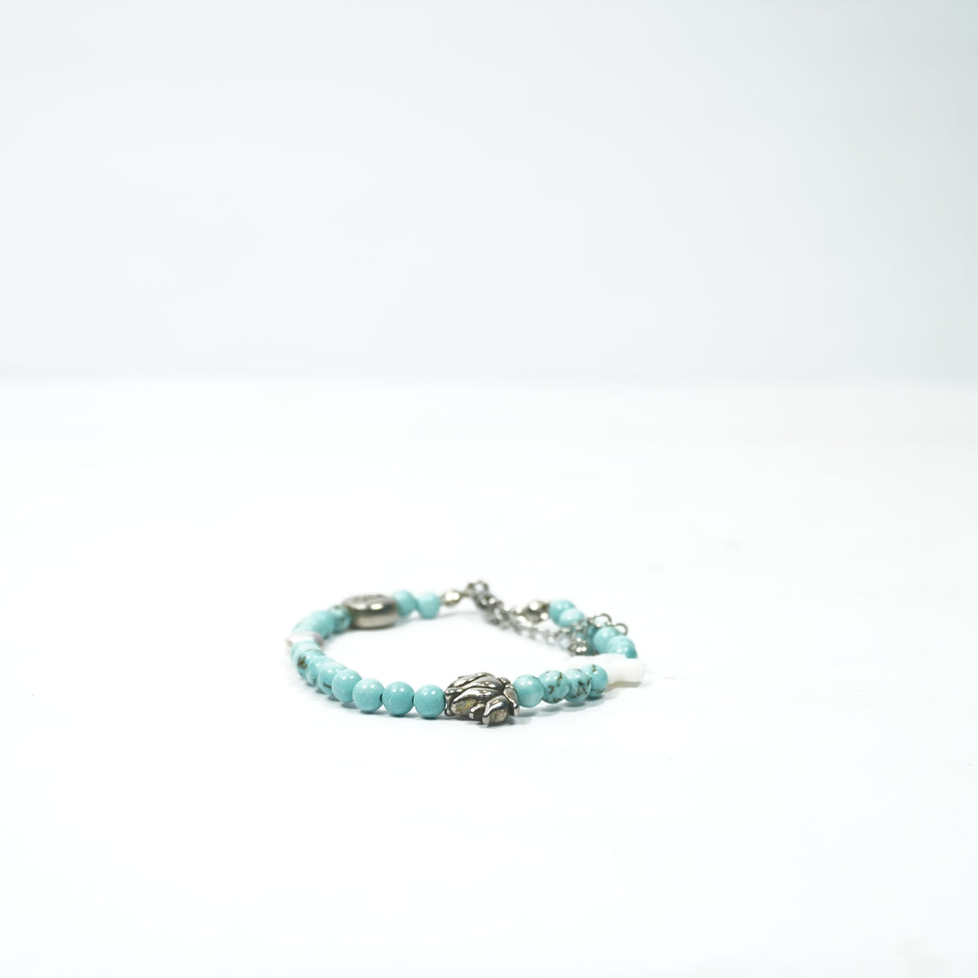 Turquoise Bracelet: Lotus and Plus Charms