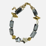 Load image into Gallery viewer, Snowflake Obsidian Bracelet: Conch and Star Charms
