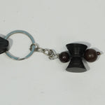 Load image into Gallery viewer, Karungali Damaru Bead Keychain – Guardian of Strength
