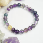 Load image into Gallery viewer, Fluorite Purple Bracelet: Chakra Renewal - Round Beads 8mm
