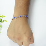 Load image into Gallery viewer, Lapis Lazuli Silver Bracelet - Oval with Design
