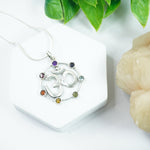 Load image into Gallery viewer, Om Silver Pendant - 7 Chakra Stones
