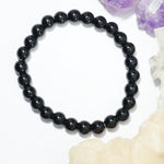 Load image into Gallery viewer, Black Onyx Bracelet: Concentration - Round Beads 8mm
