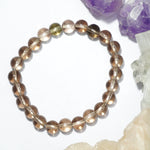 Load image into Gallery viewer, Smokey Quartz Bracelet: Removes Fear - Round Beads 8mm
