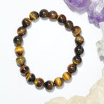 Load image into Gallery viewer, Tiger&#39;s Eye Bracelet: Boosts Self Confidence - Round Beads 8mm
