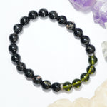 Load image into Gallery viewer, Black Tourmaline and Moldavite Bracelet: Protection and Awareness - Round Beads 8mm
