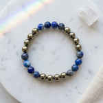 Load image into Gallery viewer, Champion Energy Bracelet – MI Jersey Edition (Lapis Lazuli &amp; Golden Pyrite)
